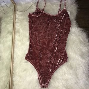 Pink velvet body suit